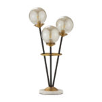 AUREUM Globus 3-light table lamp with brass accents, black metal rods, and a marble base.