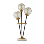 AUREUM Globus 3-light table lamp with brass accents, black metal rods, and a marble base.