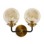 Braxton Twin Glass Wall Lamp with two amber-tinted glass globes, black metal arms, and brass accents, 37x20x31 cm.