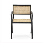 Akita Black Rattan Dining Armchair with sleek black frame and natural woven rattan seat and backrest.