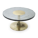 Cheswick Coffee Table with rustic aged glass top and gold aluminium pedestal base, 81x81x39 cm, modern vintage design.