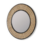 Round wall mirror featuring a handwoven rattan frame with a sleek black metal rim, measuring 80 cm in diameter. Perfect for adding a natural, bohemian touch to any room.