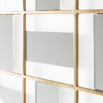 Large geometrical wall mirror with rectangular and square mirror panels, framed in thin gold-toned metal, measuring 76x187 cm. Perfect for modern and art deco-inspired interiors.