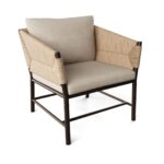 Outdoor armchair with a natural resin frame, espresso aluminum structure, and comfortable cushions. Perfect for garden, terrace, or balcony use.