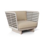 NEIL Teak Outdoor Armchair with aged teak wood and rope detailing, featuring comfortable backrest and seat cushions for outdoor use.