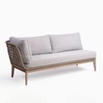 Elevate your outdoor space with the OSANA Single Arm Eucalyptus Wood Outdoor Sofa. Featuring greyish eucalyptus wood legs and cement-colored rope, this versatile piece can be used alone or paired with other OSANA range items for a modern look.