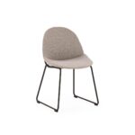 Modern CODY dining chair with grey fabric upholstery and black sled metal base.