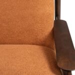 CASCA Mindi Wood Armchair with roasted coffee finish and burnt terra bouclé upholstery.