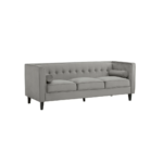 ELI Sofa with grey velvet upholstery, button-tufted backrest, bolster pillows, and black slanted oak legs, designed as a three-seat sofa.