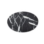 A round black marble LANDRA Chopping Board with unique veining, perfect for chopping and serving in style.