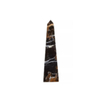 Large black marble obelisk with sleek lines and white veining, offering a modern and luxurious addition to contemporary interiors.