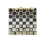 KING Chess Set with a marble chessboard and gold-accented wooden and alloy pieces for a contemporary, luxurious twist on a classic game.