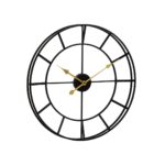 QUINN Clock with black metal skeleton frame and gold-tone spade hands, a bold oversized wall clock for modern interiors.