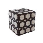 Cube-shaped OWEN Pouffe with light oatmeal jacquard, dark brown leather hexagonal patterns, and bold black zig-zag stitching.