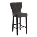 SABINA Charcoal Barstool with soft charcoal fabric upholstery, diamond-button backrest, sturdy black rubberwood legs, and sleek metal footrests.