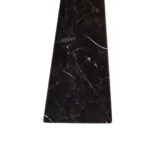 Small black marble obelisk with subtle white veining, offering a sleek and minimalist design for contemporary interiors.