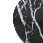 A round black marble LANDRA Chopping Board with unique veining, perfect for chopping and serving in style.