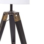 CROSSLINE Table Lamp with black wood tripod base, white linen cylinder shade, and adjustable height.