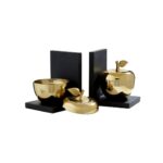 Set Of 2 Apple Bookends with black bases and gold-finish apples, featuring removable lids for discreet trinket storage.