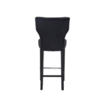 SABINA Barstool with black fabric upholstery, diamond-button backrest, sturdy black rubberwood legs, and metal footrests, perfect for modern interiors.