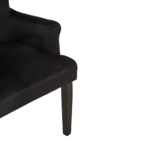 LEWIS Dining Chair upholstered in black velvet with buttoned back, silver stud accents, ring-back detail, scrolled armrests, and black rubberwood legs.