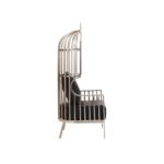 FROST Chair with silver cage frame and black leather-effect cushions, offering luxurious comfort and modern style.