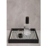 VOSS Square Tray with bold black-and-white 3D striped design, handcrafted wood with resin finish for serving or showcasing.