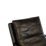 BASTIEN Black Lounge Chair with distressed genuine leather, cushioned backrest and seat, and sleek metallic frame for a modern industrial look.