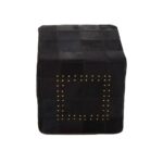 MILO Pouffe with black cowhide leather patchwork design and metallic stud details, perfect as a stylish and versatile accent piece.