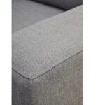 NELSON Sofa with three seats and a left chaise, upholstered in grey fabric with black metal legs for a modern and spacious living room centerpiece.