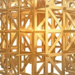 PONTES Table Lamp featuring a solid brass lattice design, brushed brass finish, integrated touch dimmer, and dual G9 sockets for modern elegance.