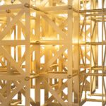 PONTES Table Lamp featuring a solid brass lattice design, brushed brass finish, integrated touch dimmer, and dual G9 sockets for modern elegance.