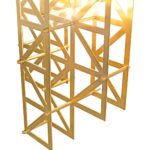 PONTES Wall Lamp featuring a solid brass lattice design in brushed brass, dual G9 sockets, and a sleek 57 cm height for modern architectural lighting.