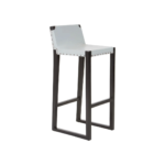 PIERCE Barstool with grey leather seat, stud detailing, and black teak wood frame with integrated footrest.