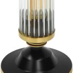 Modern cylindrical floor lamp made of solid brass and glass with a black and brushed brass finish. Features integrated dimmer and 4 E27 sockets.