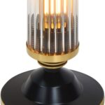 Modern cylindrical floor lamp made of solid brass and glass with a black and brushed brass finish. Features integrated dimmer and 4 E27 sockets.