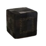 MILO Pouffe with black cowhide leather patchwork design and metallic stud details, perfect as a stylish and versatile accent piece.