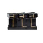 Sleek black and brass MONAX Canister Set in a rectangular tray, perfect for storage or decor.
