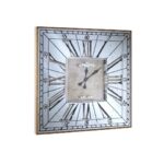 Rustic wall clock with weathered gold corners, distressed face, bold Roman numerals, and traditional black spade-style hands.