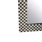 Round wall mirror with a bold black and white mother-of-pearl frame, perfect for adding a modern touch to home decor.