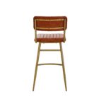 Tan leather barstool with vertical channel tufting and a sleek gold-finished angular iron frame.