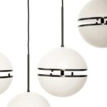 Modern black pendant light with five spherical lampshades and matte black metalwork, ideal for contemporary and industrial interiors.