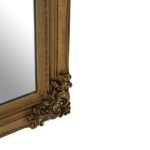 Classic wall mirror with carved motifs, weathered-effect frame, and vintage-inspired design, ideal for traditional or eclectic interiors.