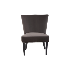 Dark mink velvet dining chair with a wingback design, deep-cushioned seat, black wood legs, and silver stud detailing.