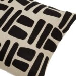 Square black and natural cotton cushion featuring a tribal geometric pattern, ideal for adding a stylish accent to sofas, chairs, or beds.