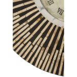 Decorative round wall clock with a black and gold sunburst frame and ribbed accents, ideal for modern and vintage interiors.