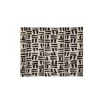 Black and natural geometric patterned throw with a textured finish, perfect for draping over a sofa, bed, or armchair.