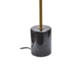 Contemporary gold table lamp with a clear glass globe and a black marble base, ideal for modern and mid-century interiors.