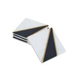 Square marble coasters with striking white, black, and gold accents, perfect for adding elegance to table settings.