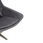 Grey velvet armchair with a silver star base, backrest cushion, and neck support, combining comfort and modern elegance.